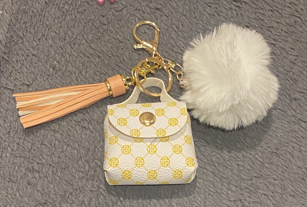 mini bag trinkle with pom-pom and tassel